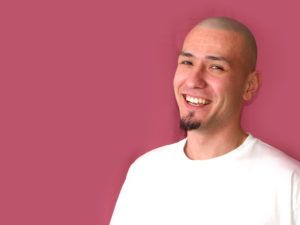 Man wearing white shirt to corporate video or photoshoot