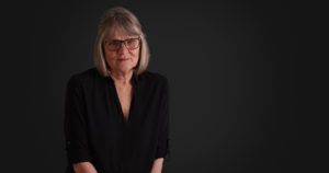 Woman wearing a black shirt for a corporate video shoot